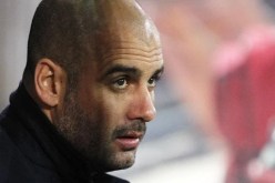 غوارديولا يشكر مورينيو على ثقته في تأهل برشلونة