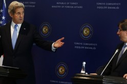 كيري واوغلو يشددان على ضرورة مناقشة بنود جنيف-1