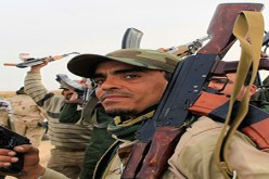 أنصار القذافي يواجهون هجوم الثوار