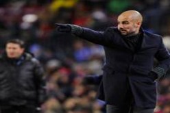 غوارديولا ينتقد التحكيم ويقر بضياع الدوري