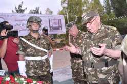  بالصور ..الفريق قايد صالح يترحم على روح الشهيد مصطفى بن بولعيد