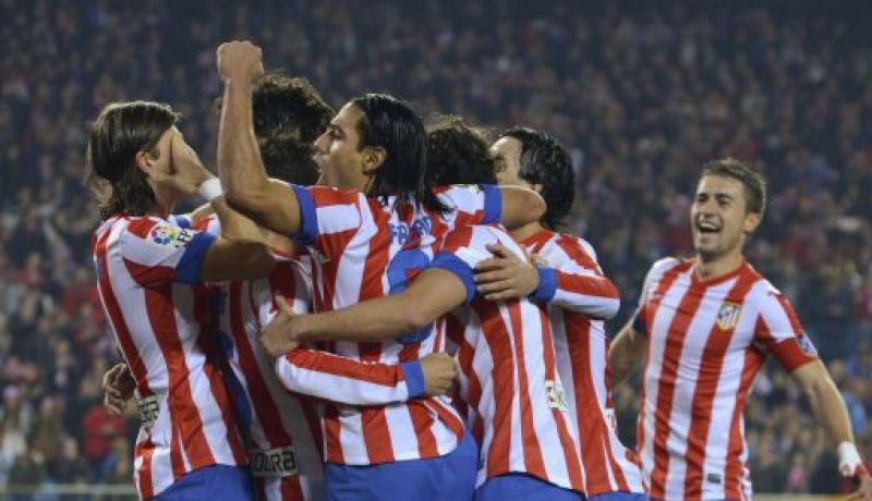 أتلتيكو مدريد يفوز على إشبيلية ويضيق الخناق على برشلونة