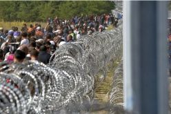 وزير ألماني يطالب بإغلاق الحدود في وجه اللاجئين