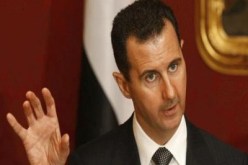 إيران: لن نسمح بسقوط الأسد