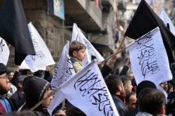 تنظيم القاعدة بالعراق يتحد مع جهادي سوريا
