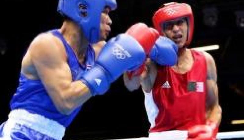 الجزائري محمد فليسي يفوز بالميدالية الفضية بعد هزيمته امام رودريغاز في مونديال للملاكمة 2013