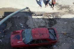 مقتل 12 شخصا وإصابة 19 آخرين في تفجيرين بالعراق