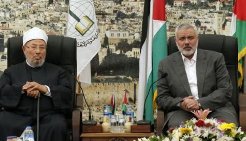 القرضاوي بجواز سفر فلسطينيا مزورا