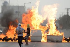 محتجون بالبحرين يشتبكون مع الشرطة قبل انطلاق سباق الفورميولا