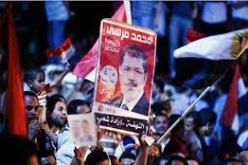 أنصار مرسي يرحبون بلقائه مع آشتون ويعتبرونه بشرة خير لعودته للسلطة