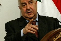 وليد المعلم: من يتبنّى العنف والإرهاب لا يتبنى الحل السياسي