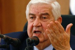 وليد المعلم ومعاذ الخطيب يزوران موسكو قريبا