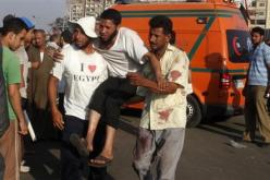 دماء وغضب وذهول بين المصابين بعد احداث الحرس الجمهوري في مصر