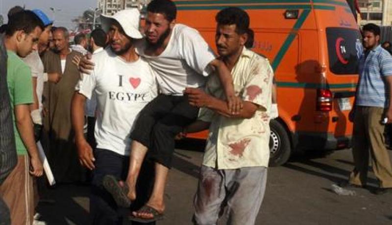 دماء وغضب وذهول بين المصابين بعد احداث الحرس الجمهوري في مصر
