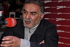 القضاء التونسي يستجوب صحافياً اتهم مسؤولاً في الداخلية بإغتيال بلعيد