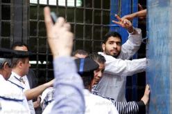القضاء المصري: حبس ناشط بارز على ذمة التحقيق بتهمة إهانة مرسي
