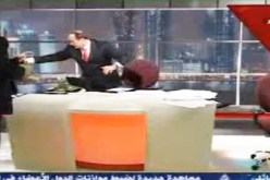 اشتباك بالأيدي على المباشر في قناة الجزيرة