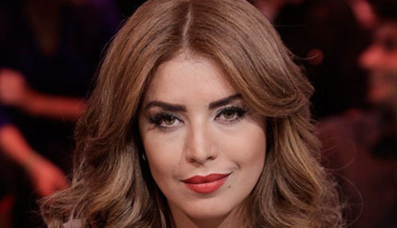 بالصور أمل بوشوشة بالفستان الأبيض والطرحة