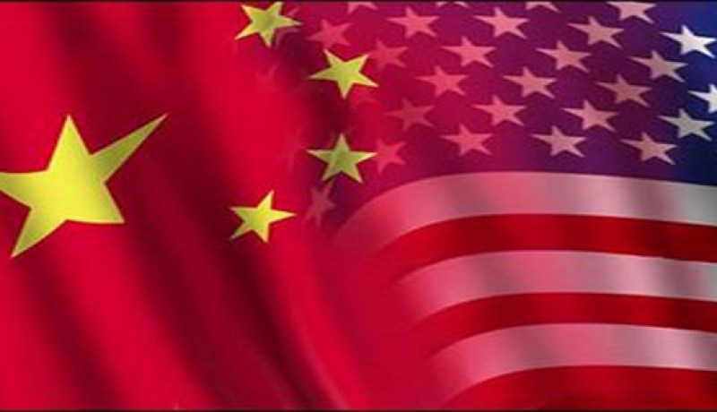 أمريكا تتهم الصين بالتحريض على مؤامرة ضد عملاق الكيمياويات دوبونت