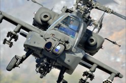 إشراك مروحيات فرنسية وبريطانية في الهجمات على العقيد القذافي