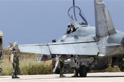 التحالف يطلق صواريخ ويشن هجمات جوية على قوات القذافي