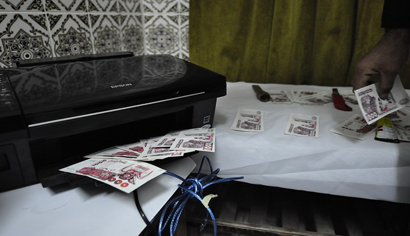 الإطاحة بشبكة دولية حاولت إغراق السوق الوطنية بأوراق نقدية مزورة في بومرداس