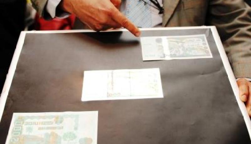 ورقة 2000 دينار معرضة للتزوير