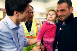 رئيس الوزراء الكندي يستقبل اللاجئين السوريين