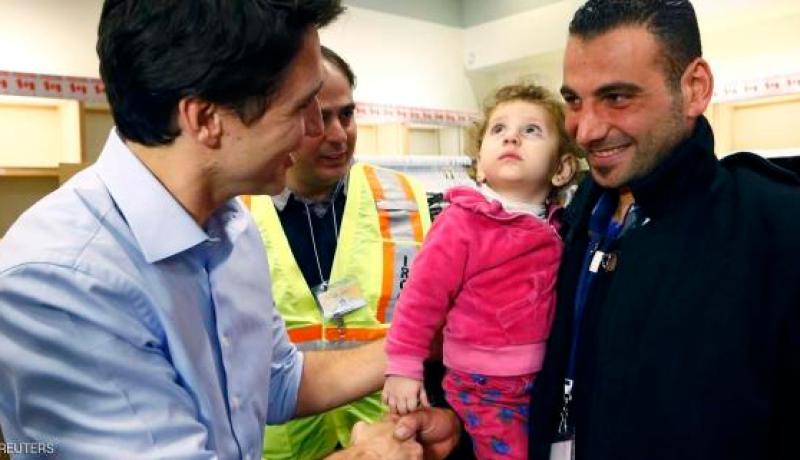 رئيس الوزراء الكندي يستقبل اللاجئين السوريين