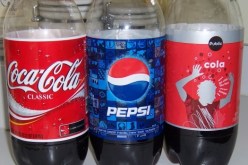 منشورات بالعاصمة تدعو لمقاطعة كوكا وبيبسي