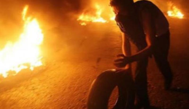 إحراق وتحطيم محلات تجارية يملكها علويون في طرابلس بشمال لبنان