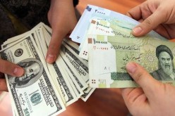 وقف التعامل بالدولار الأمريكي في التبادلات التجارية في إيران