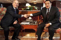 أولمرت:العديد من قادة الدول العربية يحثونني على مواصلة العملية العسكرية