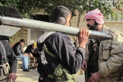 الجيش السوري الحر: لا حل إلا بتنحي الأسد ومحاكمته