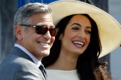 جورج كلوني وزوجته يتبرعان بنصف مليون دولار