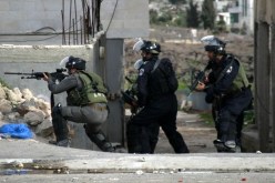 إصابة 15 فلسطينيًا في مواجهات مع جيش إسرائيل بضواحي القدس