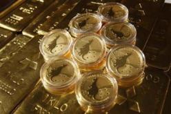 استقرار الذهب بسبب ضعف الدولار وتوقعات بتراجع الاسعار