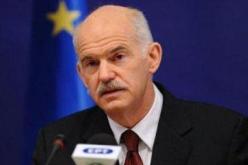 باباندريو ينصح القذافي بالعمل من اجل مخرج سلمي في ليبيا