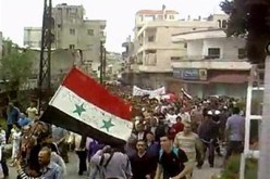 دوي قذائف ورشقات أعيرة نارية في حي بابا عمرو في مدينة حمص السورية