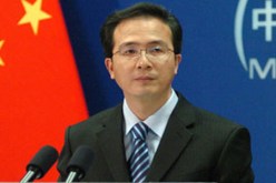 بكين تدعو المحكمة الجنائية إلى توخي الحذر إثر مذكرة التوقيف ضد القذافي