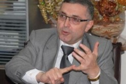 وزير سوري يدعو إلى الحوار السياسي للخروج من العنف