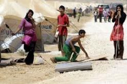إصابة 26 شرطيا وحرسا في أحداث شغب داخل مخيم للاجئين  السوريين بالأردن