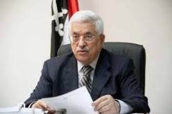 الرئيس الفلسطيني محمود عباس يوقع على قرار الانضمام إلى المحكمة الجنائية الدولية