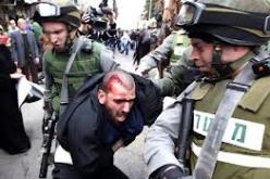 إصابة 15 شابا فلسطينيا في مواجهات مع جيش الاحتلال في رام الله