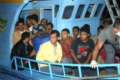 زرهوني: إنشاء مراكز لإيواء المهاجرين غير الشرعيين و منح بطاقة إقامة لمدة عشر سنوات