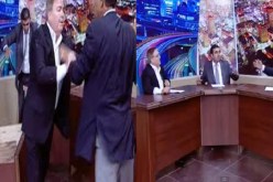 نائب أردني يشهر السلاح في وجه خصمه على الهواء