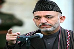 قرضاي واشنطن تسعى  إلى إقناع حركة طالبان بالدخول فى محادثات سلاح