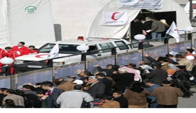 لاجئون سوريون يتلقون العلاج في مركز العون الصحي بالرمثا