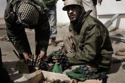 قتيلان في البريقة في اشتباكات بين الثوار وقوات القذافي