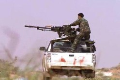 قوات ليبية تدخل سرت مسقط رأس القذافي